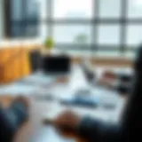 Strategic Negotiation Setup A strategic negotiation table with documents and laptops