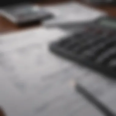 Analyzing Financial Benefits A calculator and financial documents representing account benefits analysis