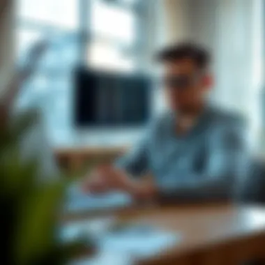 Analyzing Loan Options on Laptop A person analyzing loan options on a laptop