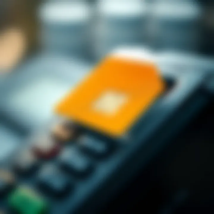 Close-up view of a chip card being inserted into a payment terminal