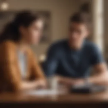 A parent and teenager discussing financial goals at a table.