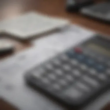 A close-up of a calculator and financial planning materials