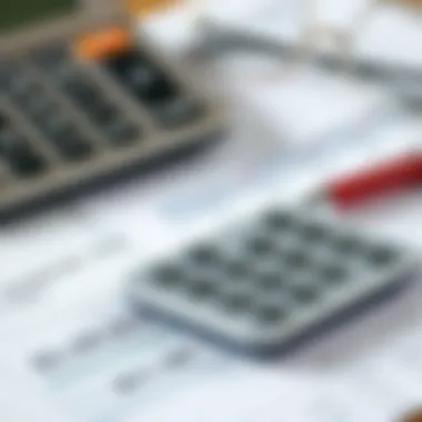 Image of a calculator with financial documents