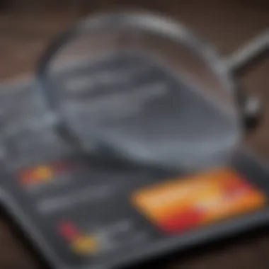 A close-up of a credit card with a magnifying glass highlighting terms